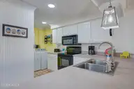 1505 Salter Path Road 435, Indian Beach, NC 28512 — 3-bedroom waterfront condo in Summer Winds Condominiums, Indian Beach, NC, photo 6 of 28: Kitchen 1