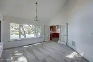 112 Coastal Bluffs Court, Hampstead, NC 28443 — 4-bedroom waterfront home in Olde Point, Hampstead, NC, photo 13 of 37: Dining Room View