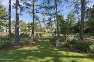 1027 Crosby Circle SW, Sunset Beach, NC 28468 — 4-bedroom home in Ocean Ridge Plantation, Sunset Beach, NC, photo 20 of 33: Pond view