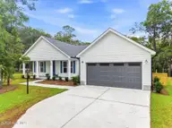 825 Sand Fiddler Court SE, Bolivia, NC 28422 — 3-bedroom waterfront home in River Run Plantation, Bolivia, NC, photo 1 of 38
