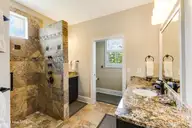 497 Broomsedge Court SE, Bolivia, NC 28422 — 4-bedroom waterfront home in Winding River Plantation, Bolivia, NC, photo 24 of 60: Primary bathroom