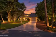 152 Arborvitae Drive, Pine Knoll Shores, NC 28512 — 3-bedroom waterfront home in Pine Knoll Association, Pine Knoll Shores, NC, photo 4 of 61: Virtually staged front of house