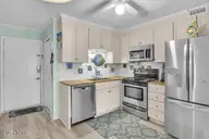 1404 Canal Drive 15, Carolina Beach, NC 28428 — 2-bedroom condo in Ocean Harbor, Carolina Beach, NC, photo 11 of 32: 04-Final 1404 Canal Dr Unit 15-RJREM-216
