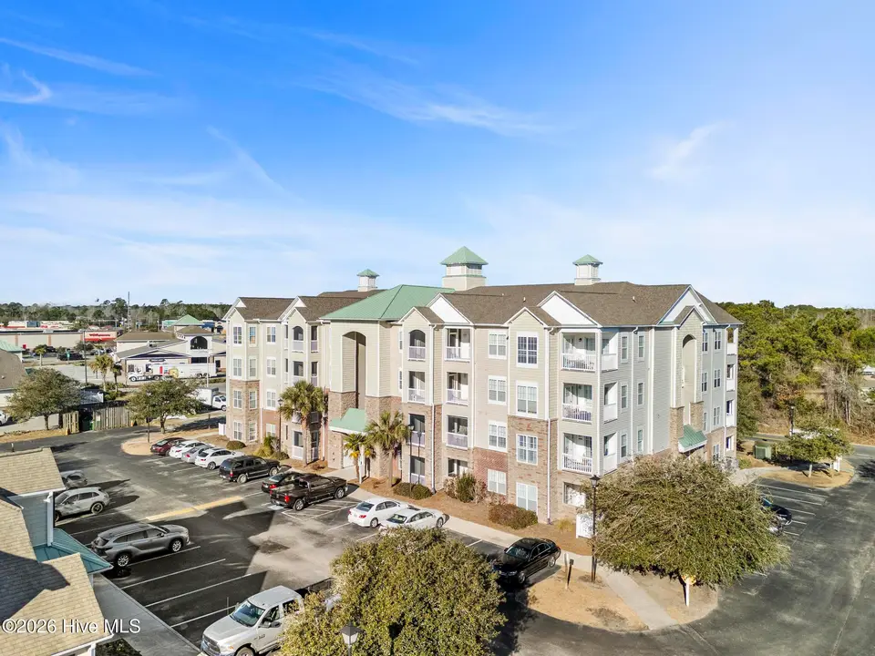 100 Gateway Condos Drive Unit 115, Surf City, NC 28445 — 4-bedroom condo in Surf City Gateway Condos, Surf City, NC, photo 1 of 35: DJI_20260212091356_0996_D