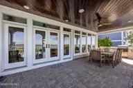 8404 Sound Drive, Emerald Isle, NC 28594 — 5-bedroom waterfront home in Emerald Isle By The Sea, Emerald Isle, NC, photo 21 of 67: Back Patio
