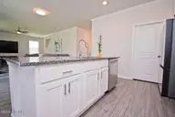 271 Jones Ridge Lane Lot 51, Newport, NC 28570 — 4-bedroom home in Ballantine Grove, Newport, NC, photo 12 of 44: Kitchen Island