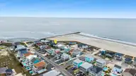 461 E Third Street, Ocean Isle Beach, NC 28469 — 4-bedroom waterfront home, Ocean Isle Beach, NC, photo 7 of 57: DJI_20260512105729_0844_D-1