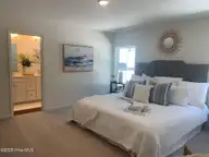 1038 Brooke Ridge Ln, Boiling Spring Lakes, NC 28461 — 3-bedroom home in Boiling Spring Lakes, Boiling Spring Lakes, NC, photo 9 of 25: Hickory bedroom