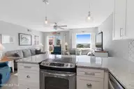 9201 Coast Guard Road A208, Emerald Isle, NC 28594 — 3-bedroom waterfront condo in Pebble Beach, Emerald Isle, NC, photo 12 of 45: Kitchen with granite countertops