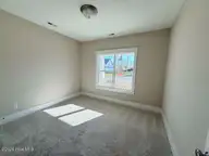 132 Flat Clam Drive, Wilmington, NC 28401 — 4-bedroom home in Riverside Cove, Wilmington, NC, photo 19 of 28: Guest Bedroom