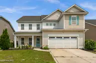 97 Violetear Ridge, Hampstead, NC 28443 — 3-bedroom home in Sparrows Bend, Hampstead, NC, photo 1 of 44: Front Outside