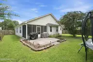 135 Luke Court, New Bern, NC 28560 — 3-bedroom home in Wavy Meadows, New Bern, NC, photo 24 of 35: Rear Patio