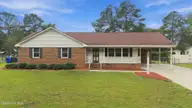 1120 Par Three Drive S, Wilson, NC 27893 — 3-bedroom home in Willow Springs, Wilson, NC, photo 1 of 50: Front