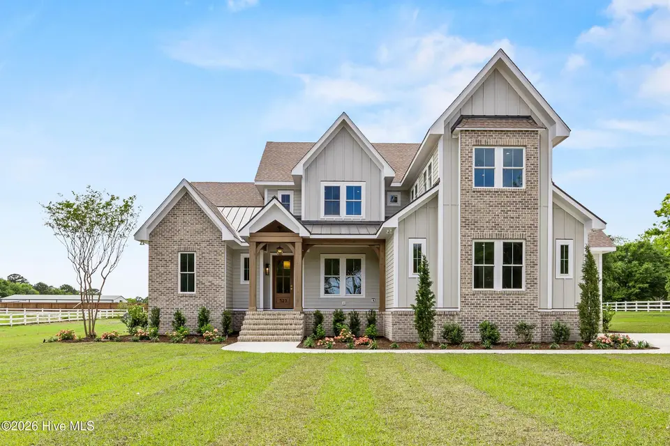 523 Ballast Point Road, Hampstead, NC 28443 — 5-bedroom waterfront home in Sloop Point Plantation, Hampstead, NC, photo 1 of 61: 1_front exterior