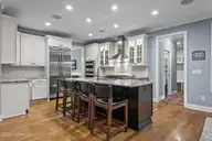 105 Saville Row, Pinehurst, NC 28374 — 4-bedroom home in Linden Close, Pinehurst, NC, photo 21 of 45: Kitchen Island
