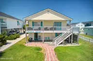 1041 1st Street, Surf City, NC 28445 — 3-bedroom waterfront home in Old Settlers Beach, Surf City, NC, photo 1 of 64
