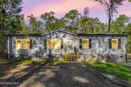 4625 Smith Briggs Lane, Northwest, NC 28451 — 3-bedroom manufactured home in Northwest, Northwest, NC, photo 1 of 35: 1_virtual twilight