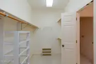 67 Stoneykirk Drive, Pinehurst, NC 28374 — 3-bedroom home in Pinewild CC, Pinehurst, NC, photo 19 of 40: primary closet2
