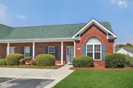 1521 Honeybee Lane, Wilmington, NC 28412 — 3-bedroom condo in Willoughby Park, Wilmington, NC, photo 1 of 33: 1521HoneybeeLane-3_Grass