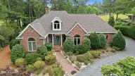 27 Mcmichael Drive, Pinehurst, NC 28374 — 4-bedroom home in Pinewild CC, Pinehurst, NC, photo 2 of 51: 3-web-or-mls-DJI_20260627122003_0373_D