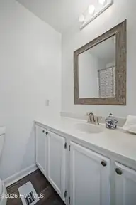1909 Cedar Point Circle, Elizabeth City, NC 27909 — 3-bedroom home in Briarwood, Elizabeth City, NC, photo 17 of 37: Primary Half Bathroom