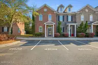 4838 Exton Park Loop, Castle Hayne, NC 28429 — 2-bedroom townhome in Exton Park Townhomes, Castle Hayne, NC, photo 2 of 25: Front View Exton Park