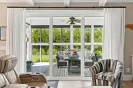 210 Knots Bend Drive, Hampstead, NC 28443 — 4-bedroom home in Salters Haven at Lea Marina, Hampstead, NC, photo 20 of 72: 34_living room sunroom