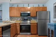 1840 New River Inlet Road 2308, North Topsail Beach, NC 28460 — 2-bedroom waterfront condo in Topsail Dunes, North Topsail Beach, NC, photo 16 of 44: Kitchen