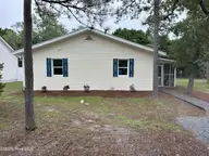114 NW 14th Street, Oak Island, NC 28465 — 3-bedroom home, Oak Island, NC, photo 6 of 48: 114 NW 14TH St Primary