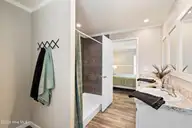 6745 Lewis Drive SE, Winnabow, NC 28479 — 3-bedroom manufactured home in Lewis Acres, Winnabow, NC, photo 20 of 28: Master bathroom
