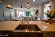 9095 Devaun Park Boulevard SW, Calabash, NC 28467 — 3-bedroom home in Devaun Park, Calabash, NC, photo 16 of 52: Kitchen/Living
