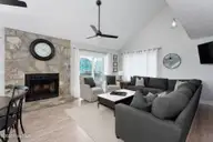 1707 S Shore Drive, Surf City, NC 28445 — 3-bedroom waterfront home in White Hills Beach, Surf City, NC, photo 14 of 65: living-room-01c