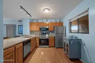 1840 New River Inlet Road 2308, North Topsail Beach, NC 28460 — 2-bedroom waterfront condo in Topsail Dunes, North Topsail Beach, NC, photo 15 of 44: Kitchen