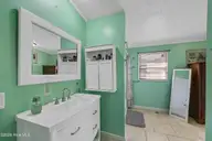 195 Calabash Road NW, Calabash, NC 28467 — 3-bedroom manufactured home in Carolina Shores, Calabash, NC, photo 23 of 37: Primary Bathroom
