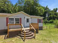 304 Mullins Street, Princeville, NC 27886 — 4-bedroom manufactured home, Princeville, NC, photo 5 of 47: Front Porch