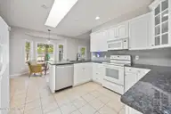 1235 Burning Tree Road 12, Pinehurst, NC 28374 — 3-bedroom home in Unit 12, Pinehurst, NC, photo 2 of 24: Kitchen