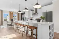 320 Barnacle Run, Wilmington, NC 28412 — 3-bedroom waterfront townhome in Riverlights, Wilmington, NC, photo 6 of 43: Kitchen Island