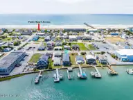 712 Channel Boulevard, Topsail Beach, NC 28445 — 4-bedroom waterfront home in New Topsail Beach, Topsail Beach, NC, photo 2 of 53: dji_20260529105531_0050_dp