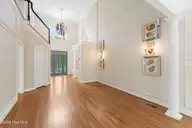 573 Coral Ridge Road, Pine Knoll Shores, NC 28512 — 4-bedroom waterfront home in Beacon's Reach, Pine Knoll Shores, NC, photo 5 of 59: Foyer and parlor