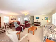 2000 Harbor Drive SW, Ocean Isle Beach, NC 28469 — 3-bedroom waterfront home in Marlee Acres, Ocean Isle Beach, NC, photo 9 of 27: Living Room