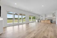 523 Ballast Point Road, Hampstead, NC 28443 — 5-bedroom waterfront home in Sloop Point Plantation, Hampstead, NC, photo 19 of 61: 20_living area