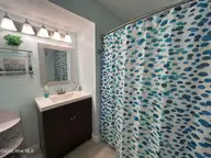 10172 Beach Drive SW Unit 2106, Calabash, NC 28467 — 2-bedroom condo in Carolina Shores Reso, Calabash, NC, photo 20 of 35: Guest Bath