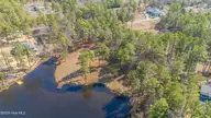 305 Lakewood Drive, Aberdeen, NC 28315 — waterfront lot in Lake Diamond, Aberdeen, NC, photo 10 of 12: 305 Lakewood Drive