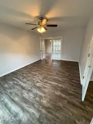102 Dockside Drive, Jacksonville, NC 28546 — 4-bedroom waterfront home in Hunters Creek, Jacksonville, NC, photo 11 of 33: Office towards dining room