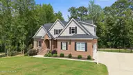 1453 Blue Heron Drive, Nashville, NC 27856 — 3-bedroom waterfront home in The Landing at Cooper Fields, Nashville, NC, photo 5 of 59: 4-web-or-mls-DJI_20260708152241_0582_D