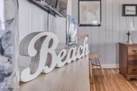 223 W Beach Drive, Oak Island, NC 28465 — 4-bedroom waterfront home, Oak Island, NC, photo 12 of 56