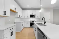 230 Cline Way Unit 130, Beaufort, NC 28516 — 3-bedroom townhome in 1809 Live Oak, Beaufort, NC, photo 12 of 42: Kitchen with Island