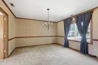 2604 One Iron Street, Morehead City, NC 28557 — 4-bedroom home in Country Club East, Morehead City, NC, photo 12 of 40: Formal dining room