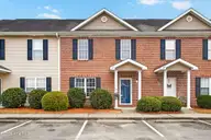 103 Lincoln Place Circle, Leland, NC 28451 — 3-bedroom townhome in Lincoln Place Townhomes, Leland, NC, photo 1 of 41: Front of Townhome