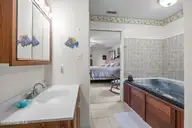1601 River Bluff Road, Morehead City, NC 28557 — 3-bedroom waterfront home in South Shores, Morehead City, NC, photo 17 of 32: Primary Ensuite